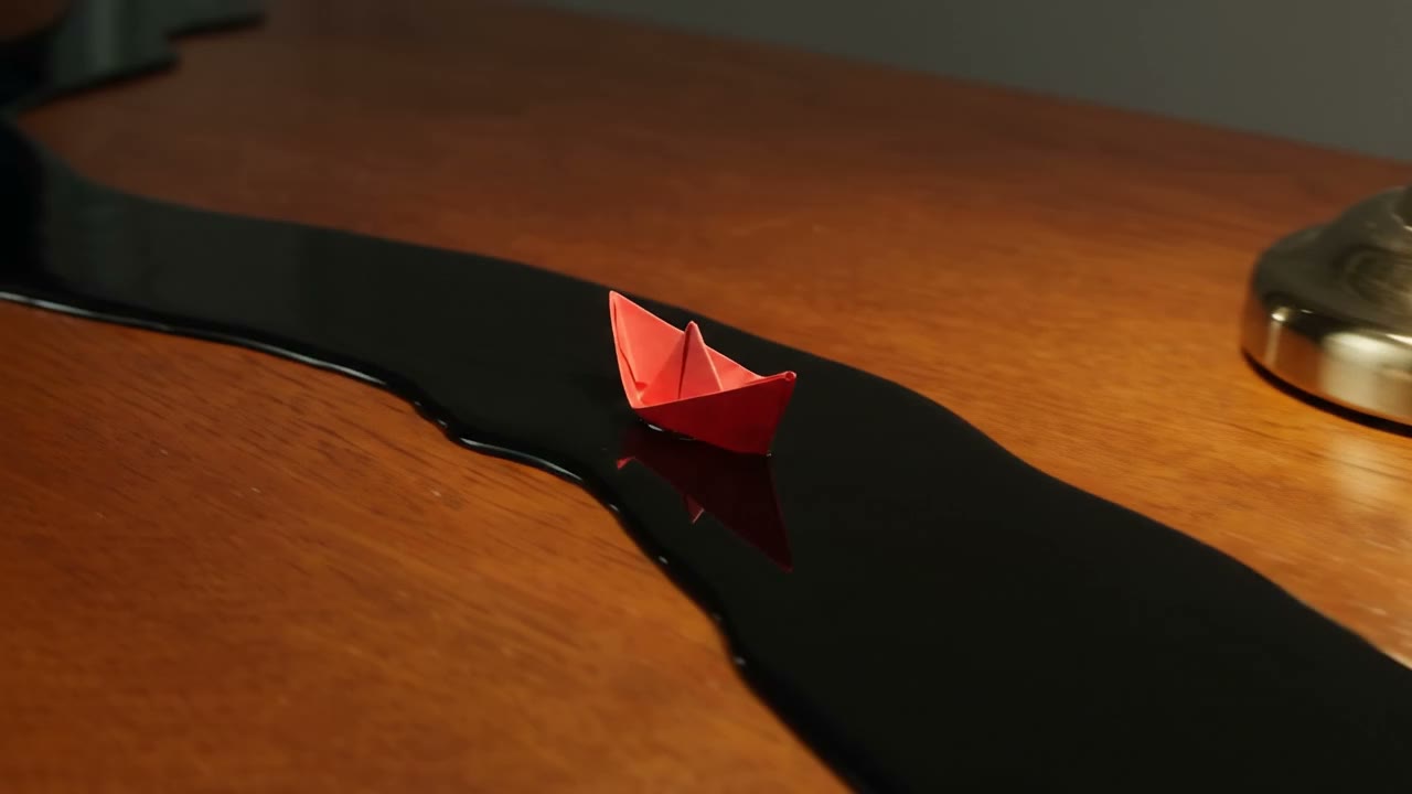 Example made with Gemini Omni 1.1: Change the white paper boat into a bright red paper boat. Keep everything else exactly the same.